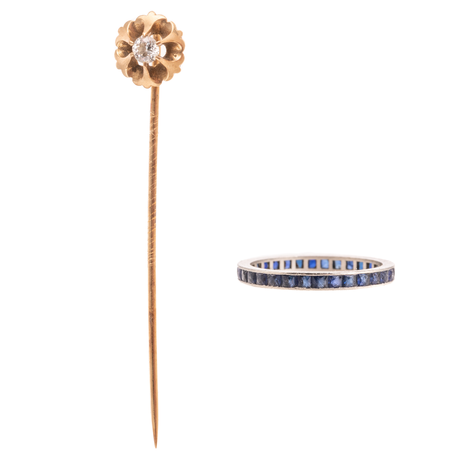 A DIAMOND STICK PIN WITH SAPPHIRE ETERNITY