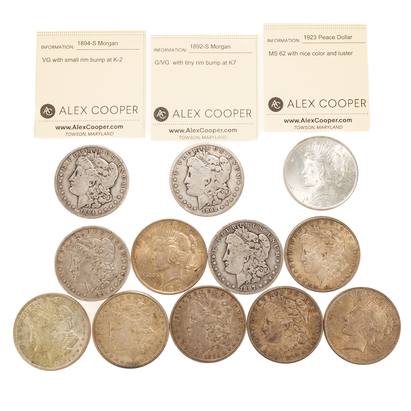 A DOZEN SILVER DOLLARS WITH 1892-S