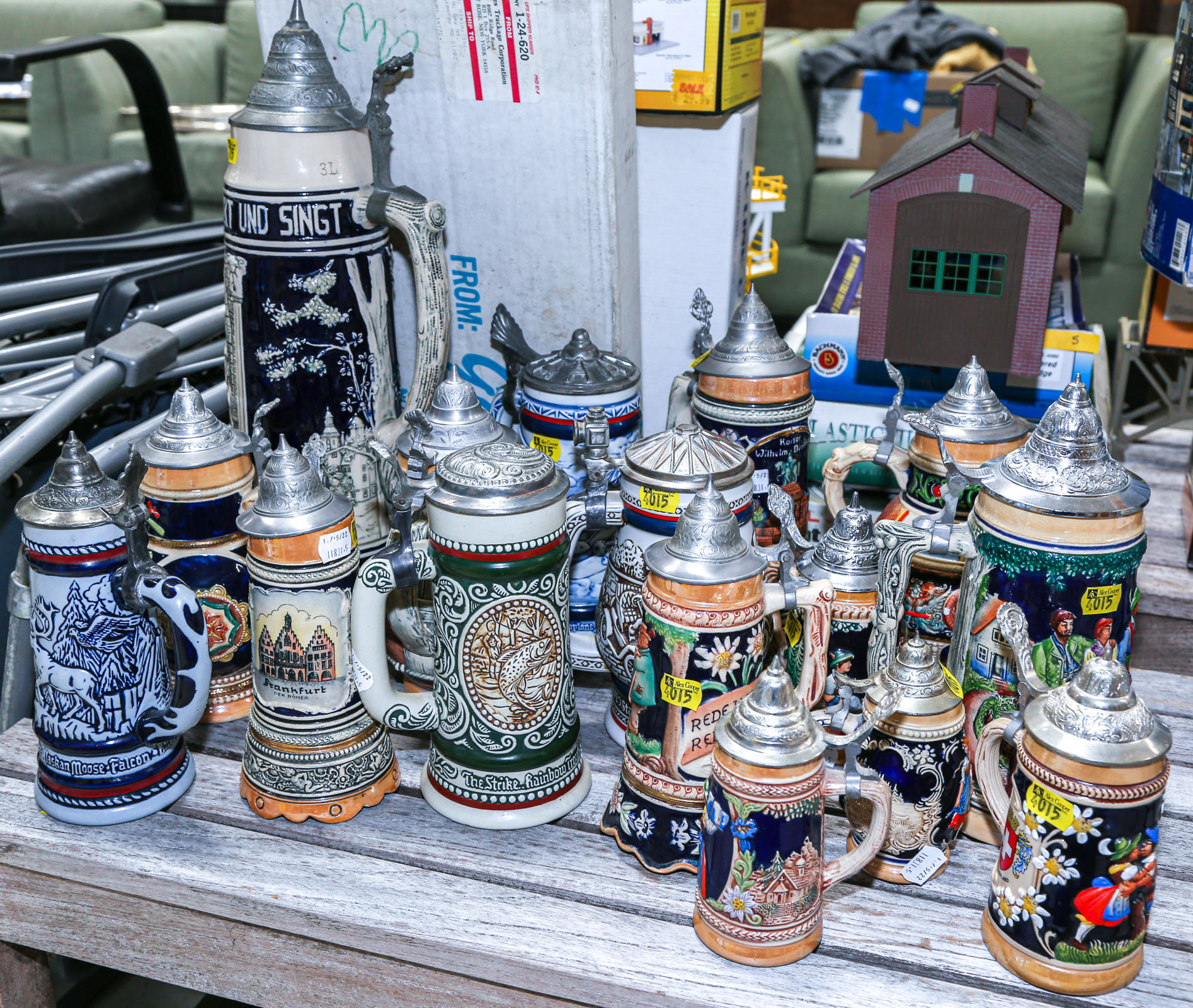 GROUP OF 16 ASSORTED CERAMIC STEINS