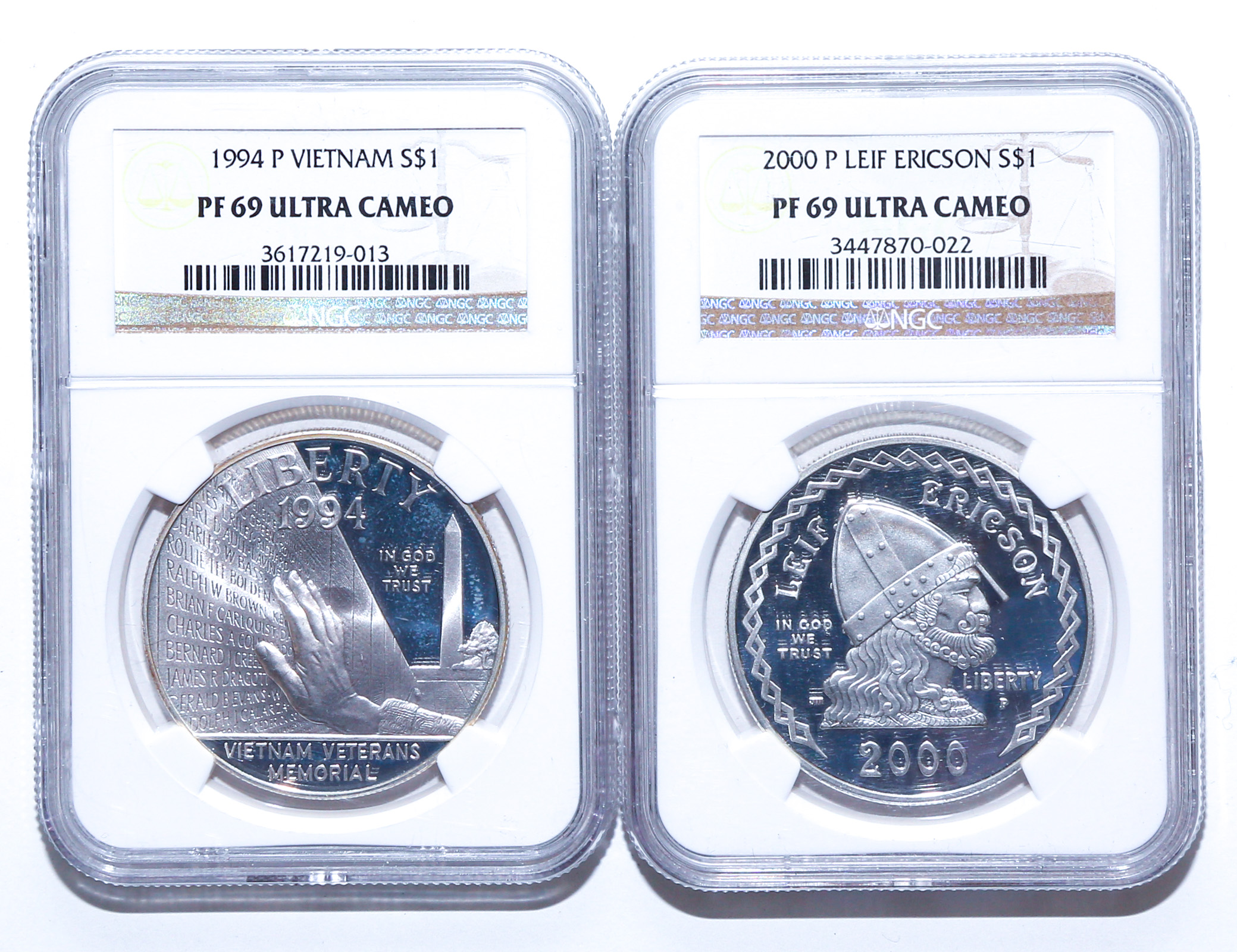 A PAIR OF COMMEMORATIVE SILVER