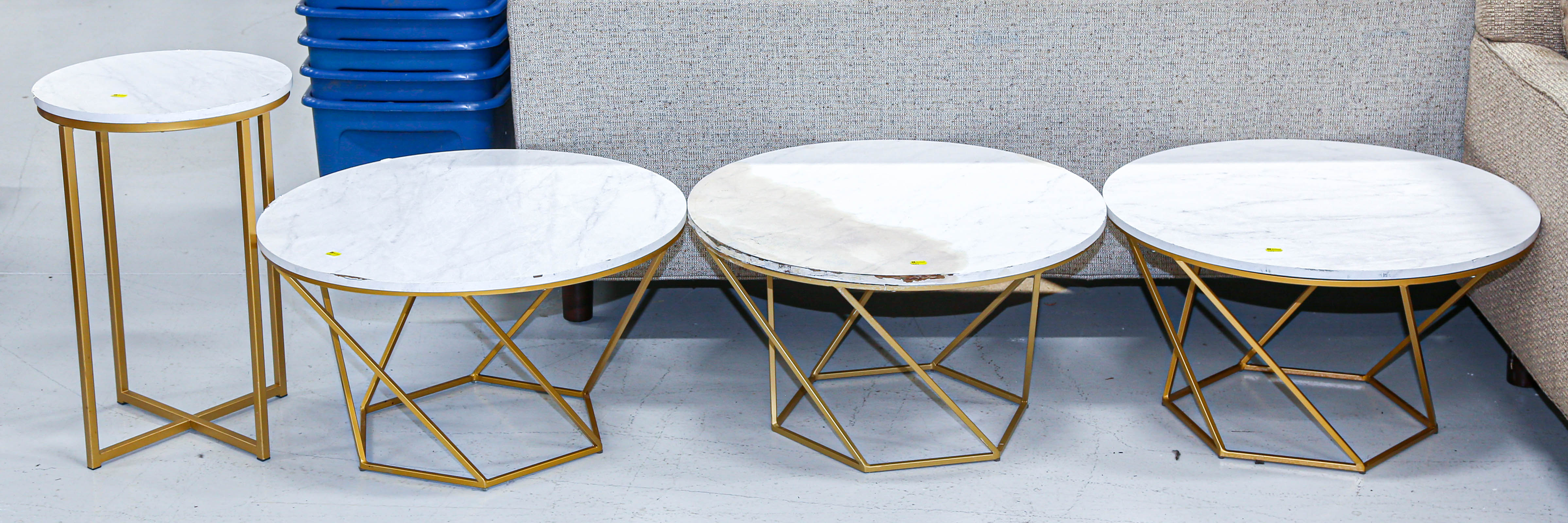 SET OF FOUR METAL BASED TABLES WITH