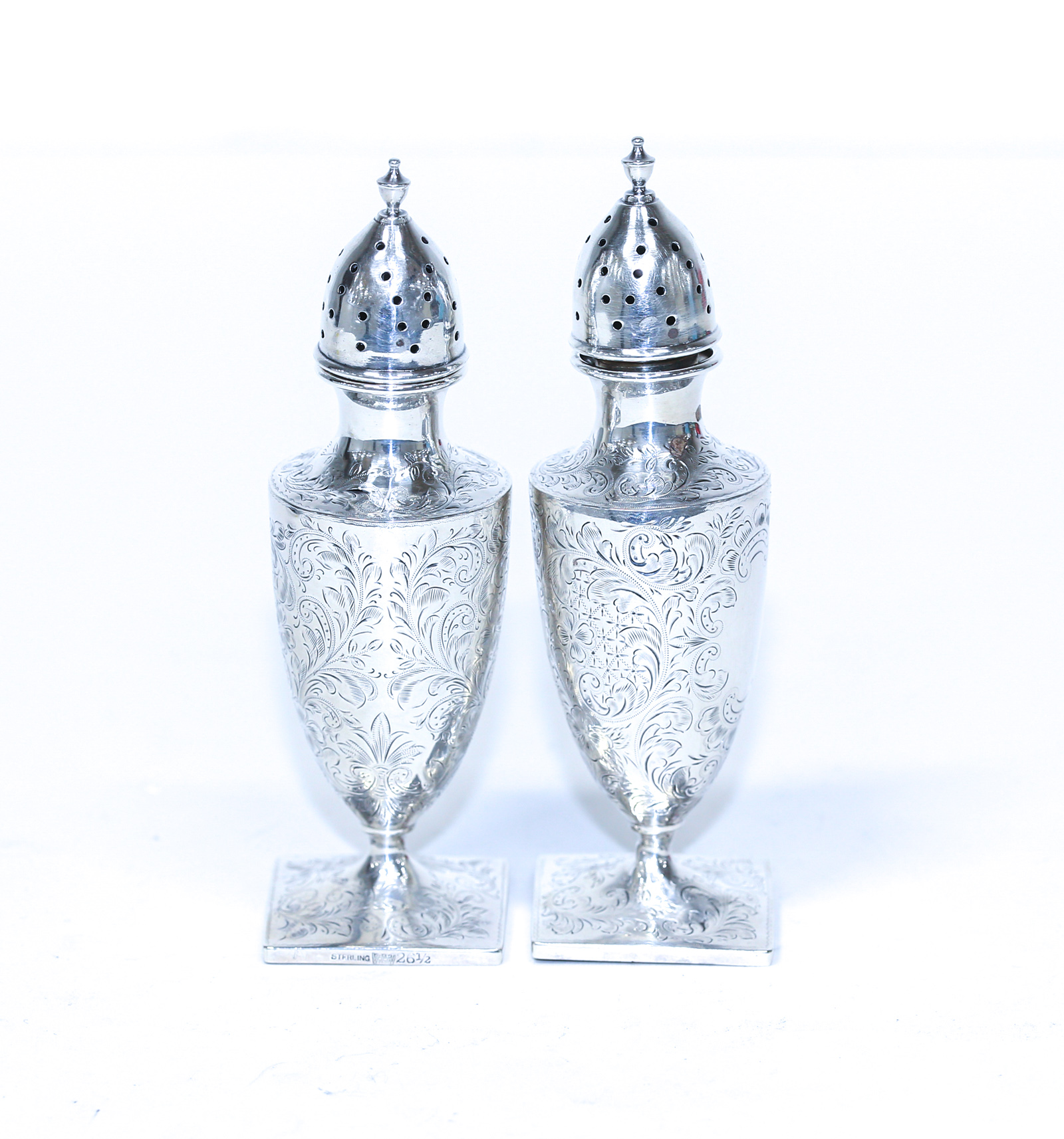 A PAIR STERLING SALT & PEPPER SHAKERS