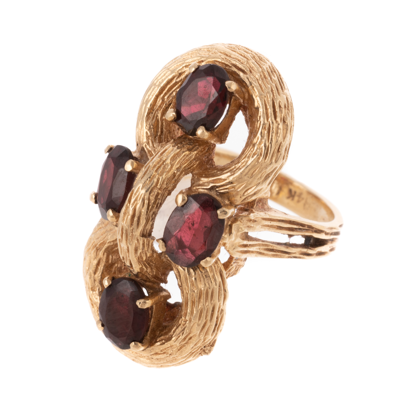 A TEXTURED KNOT RING WITH GARNETS