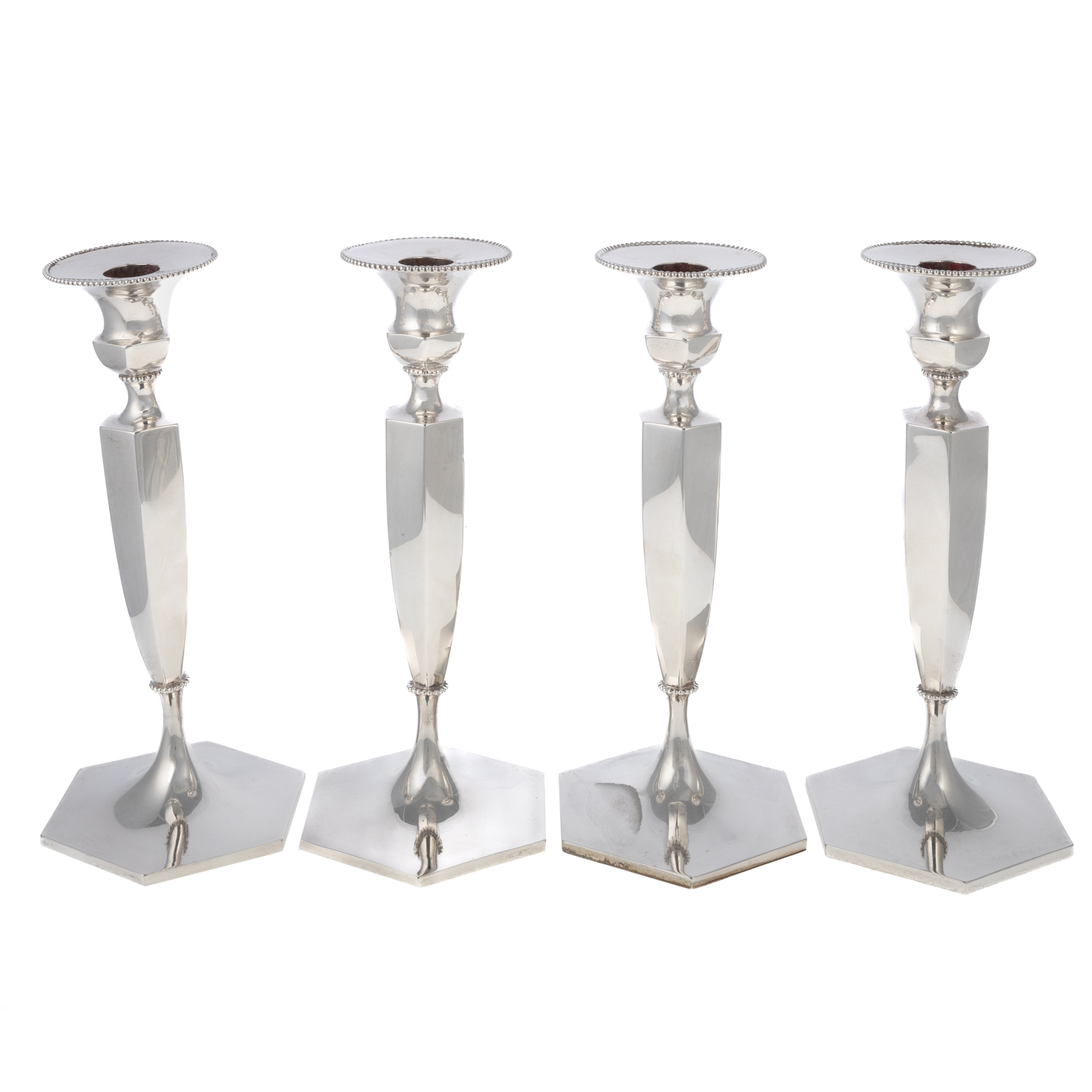 FOUR ROGER WILLIAMS STERLING CANDLESTICKS