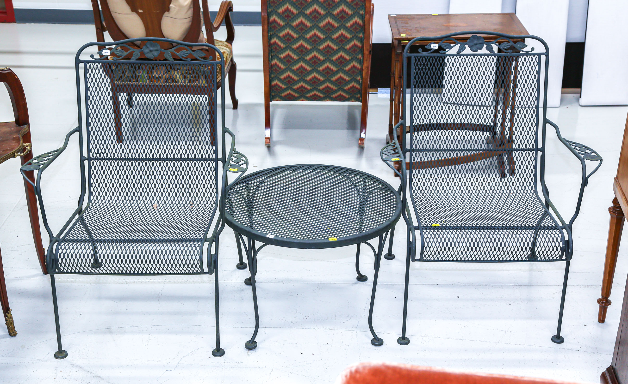 TWO IRON PATIO CHAIRS & A MATCHING