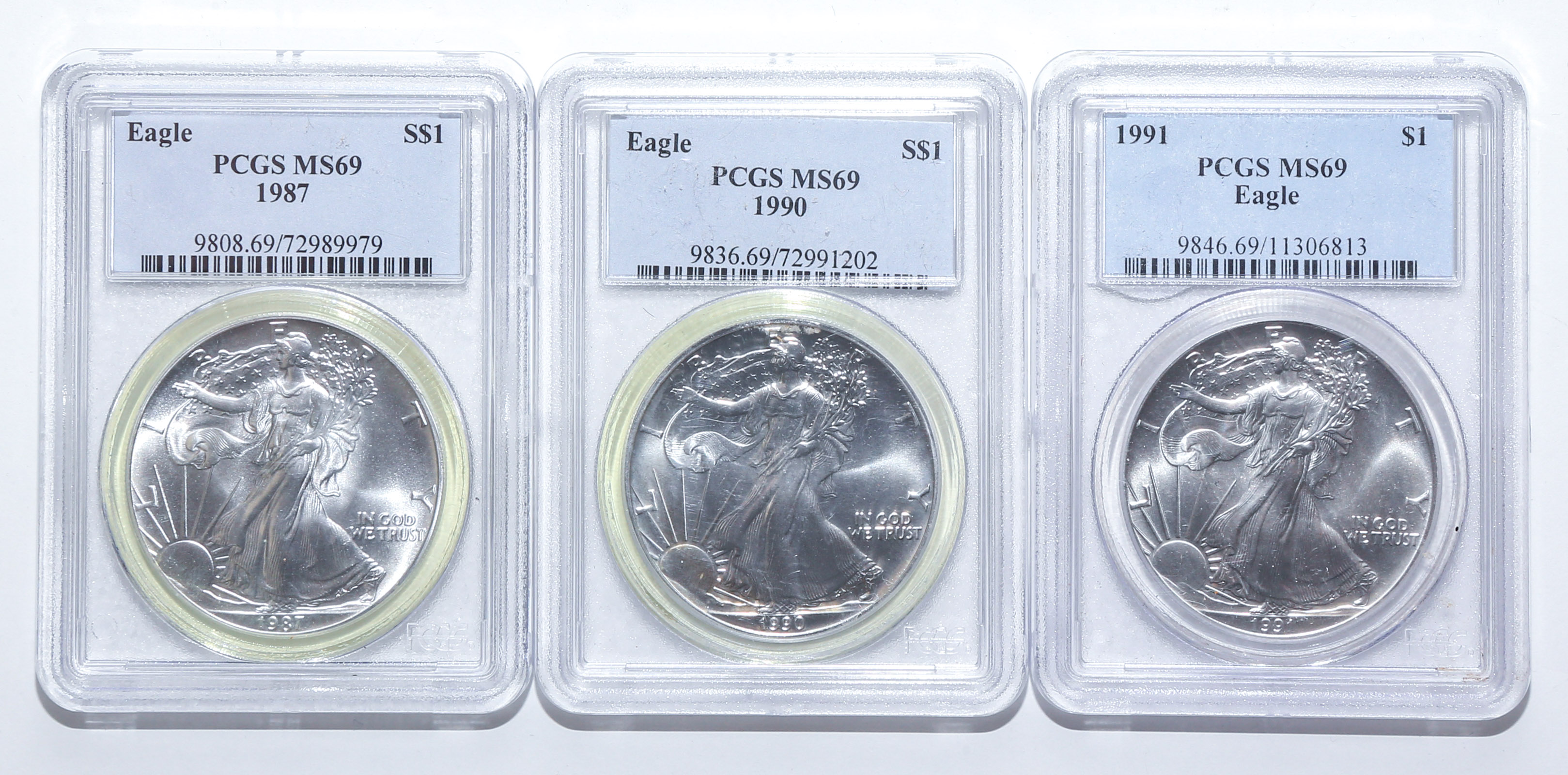 THREE EARLY SILVER EAGLES IN PCGS 2e9230