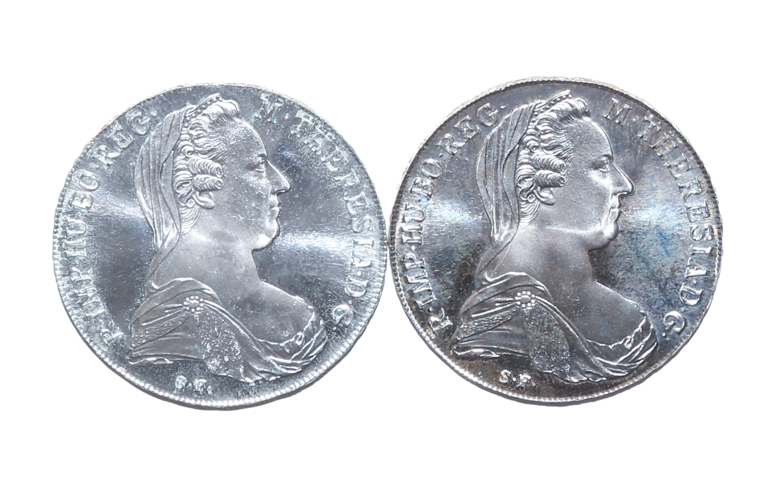 A PAIR OF MARIA THERESA SILVER