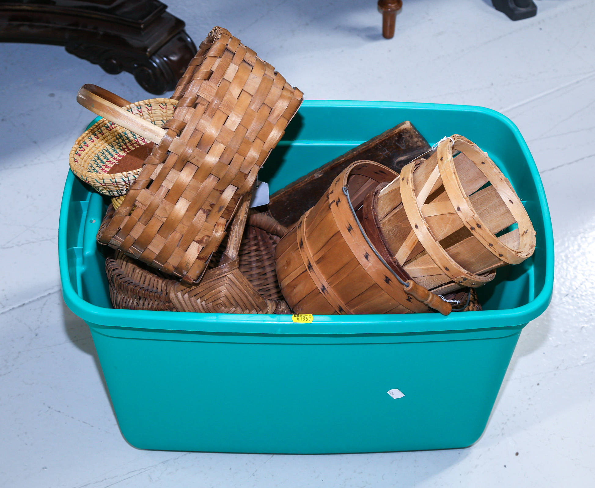 BIN OF WOVEN BASKETS .