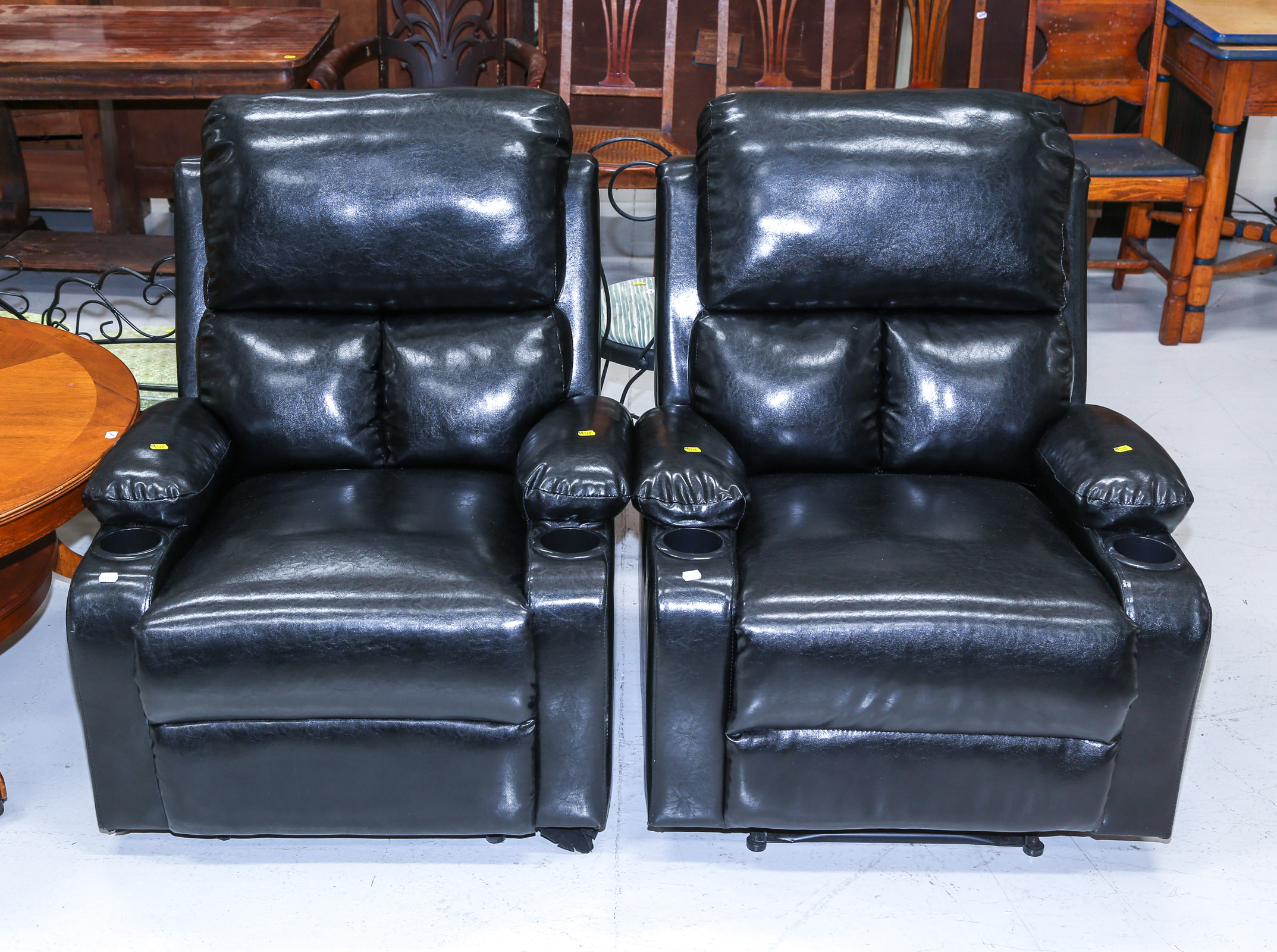 A PAIR OF RECLINING CLUB CHAIRS