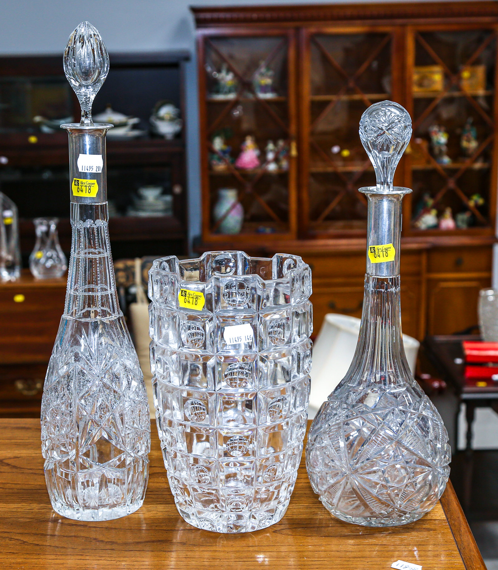 TWO CUT GLASS & SILVER DECANTERS;