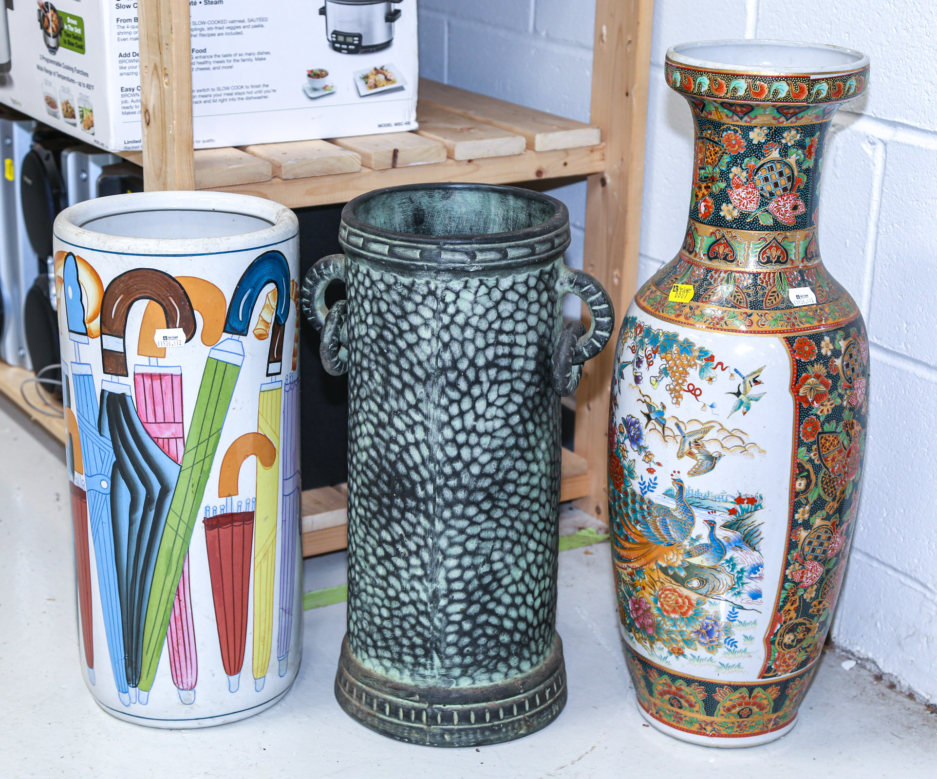 TWO UMBRELLA STANDS & A VASE Including