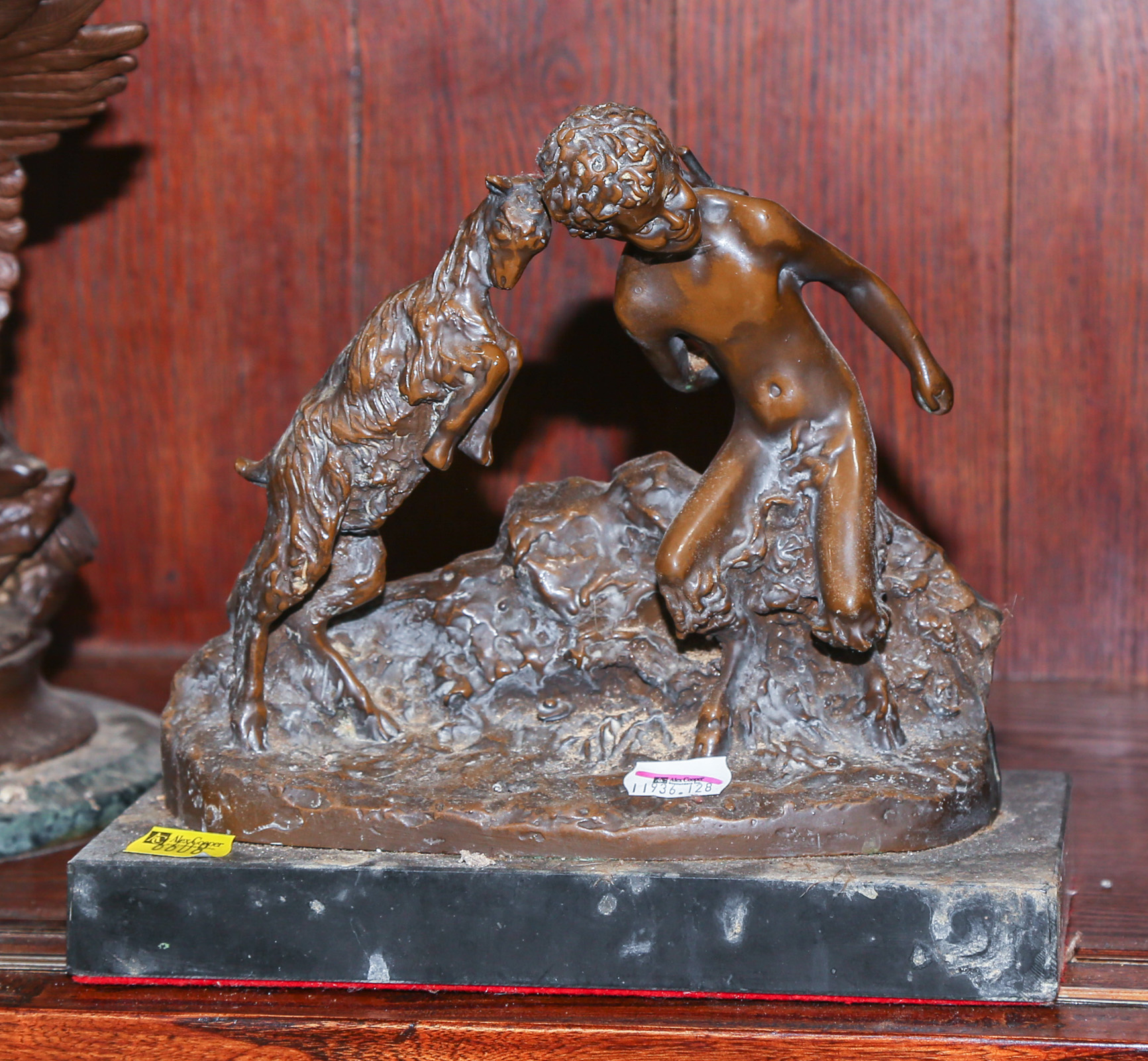 BRONZE FIGURE OF A YOUNG FAUN WITH