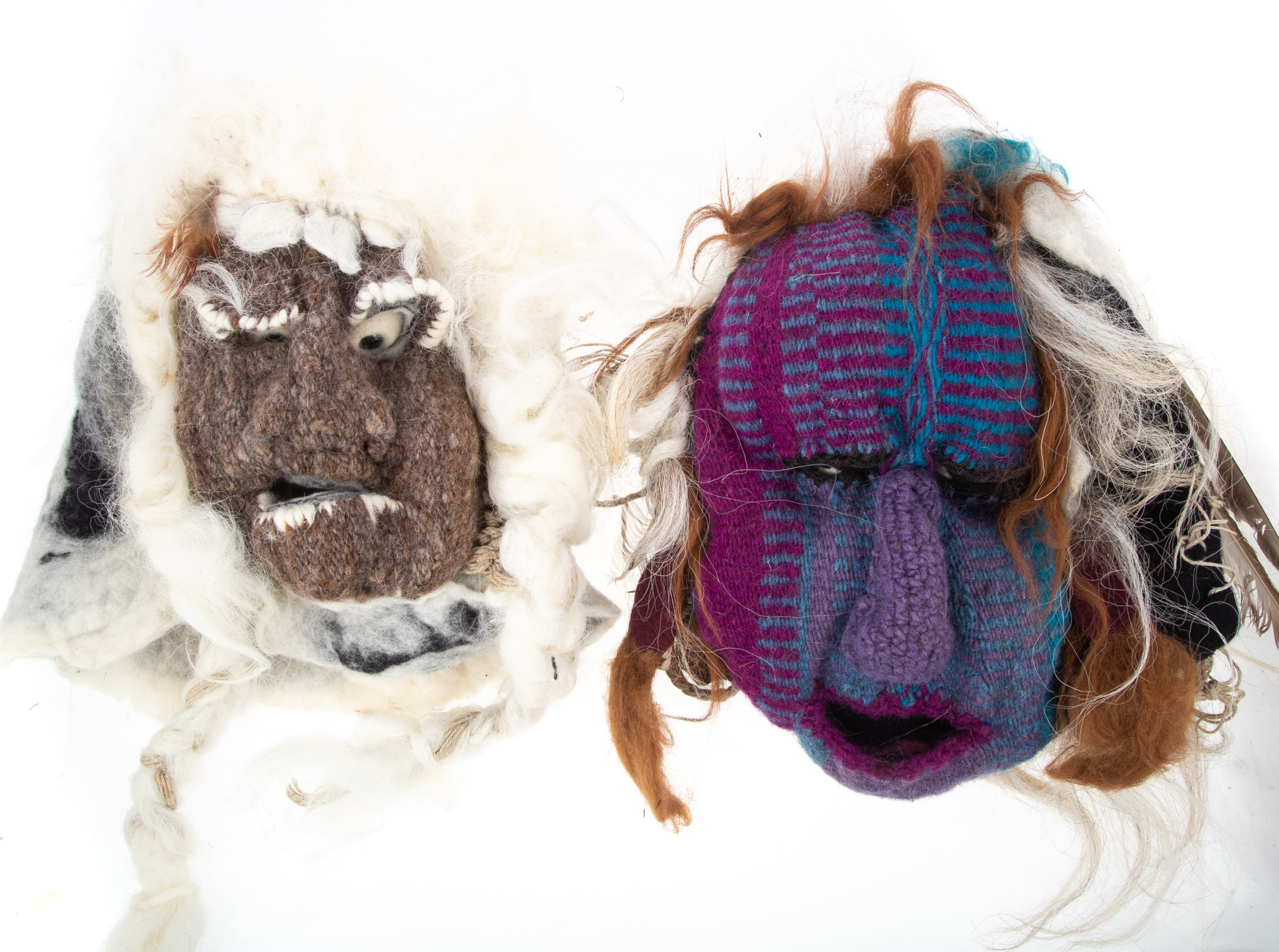 A PAIR OF FELT MASKS One pink and purple,
