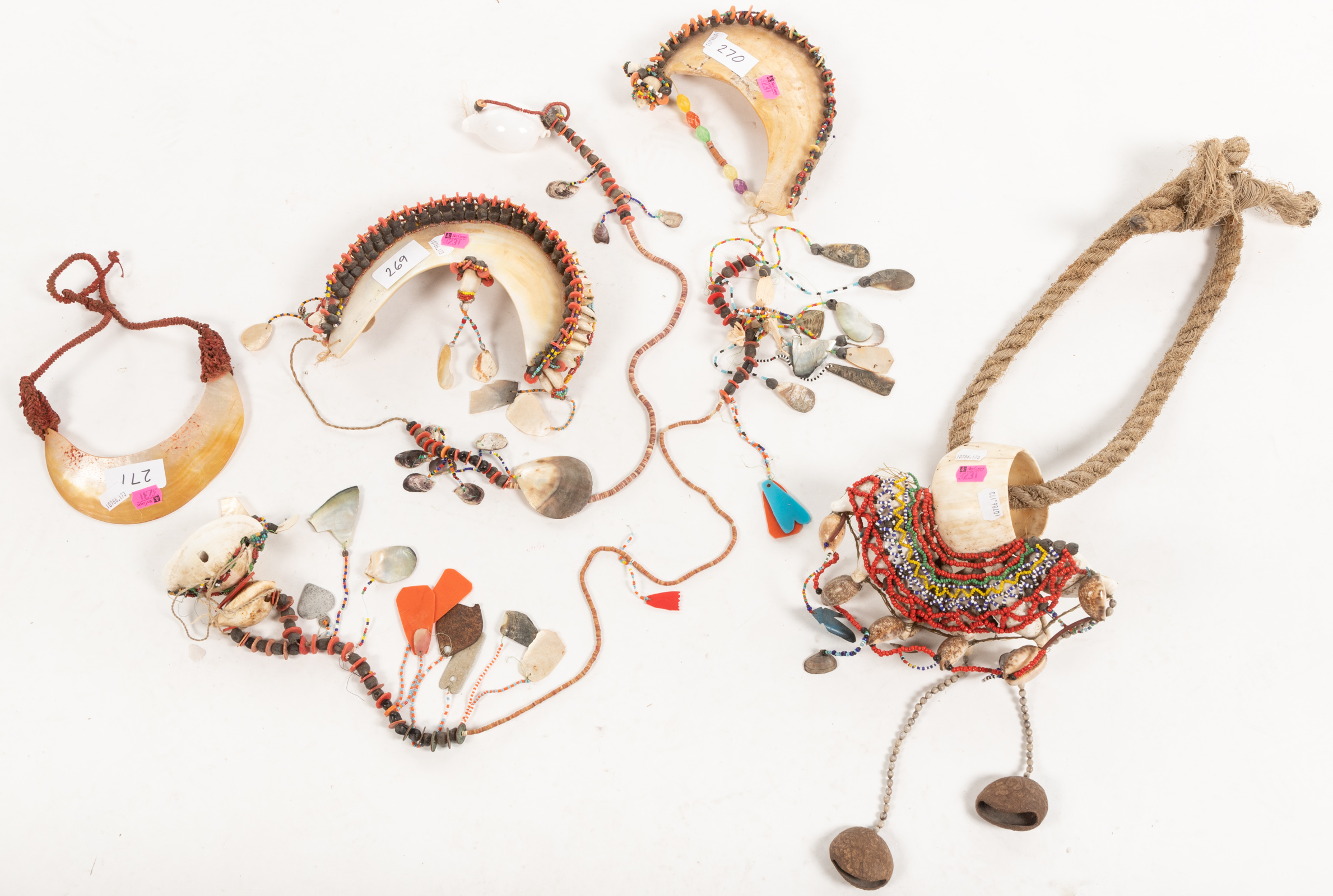 COLLECTION OF SHELL AND BEAD ORNAMENTS