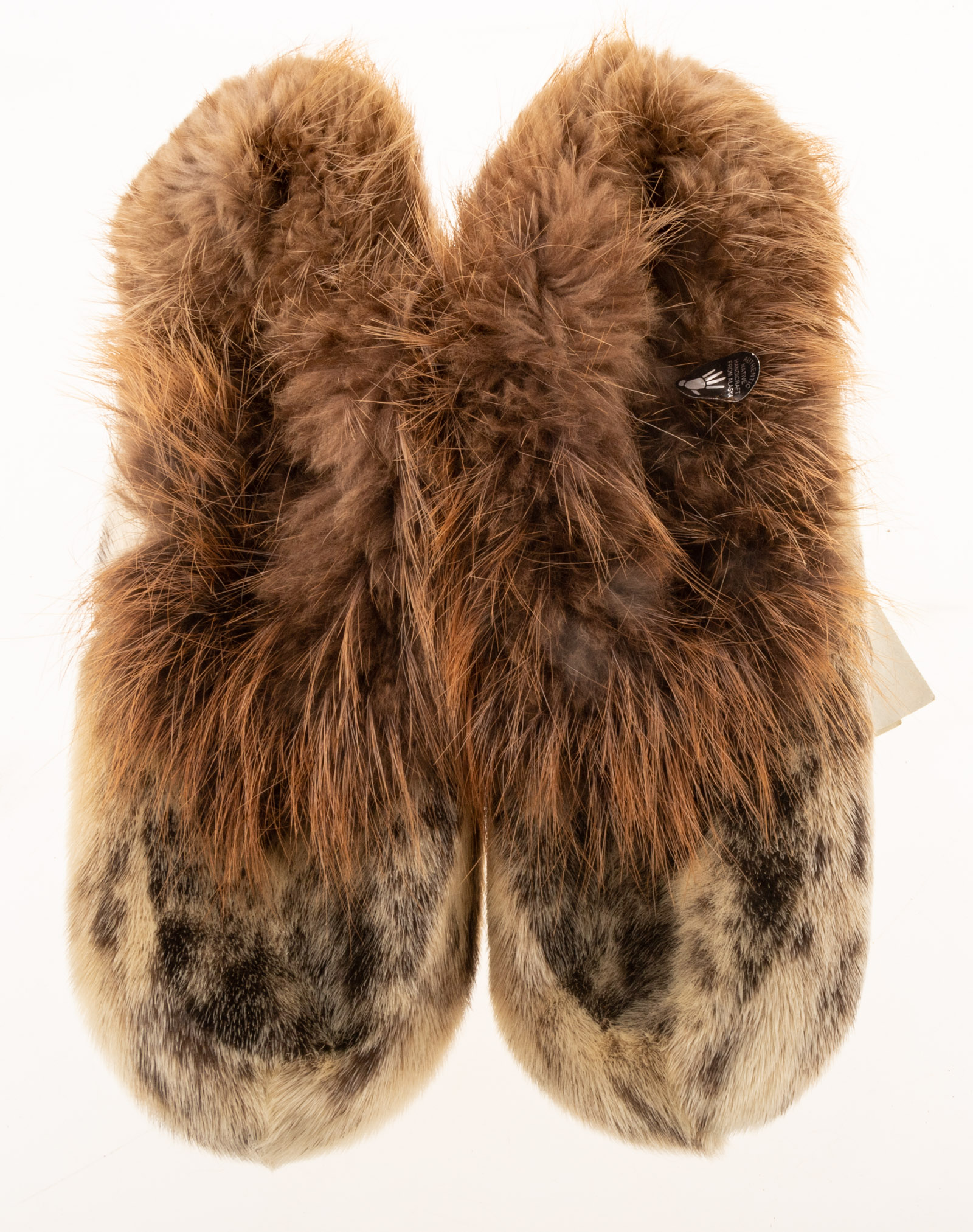 A PAIR OF SEAL SKIN SLIPPERS Marked