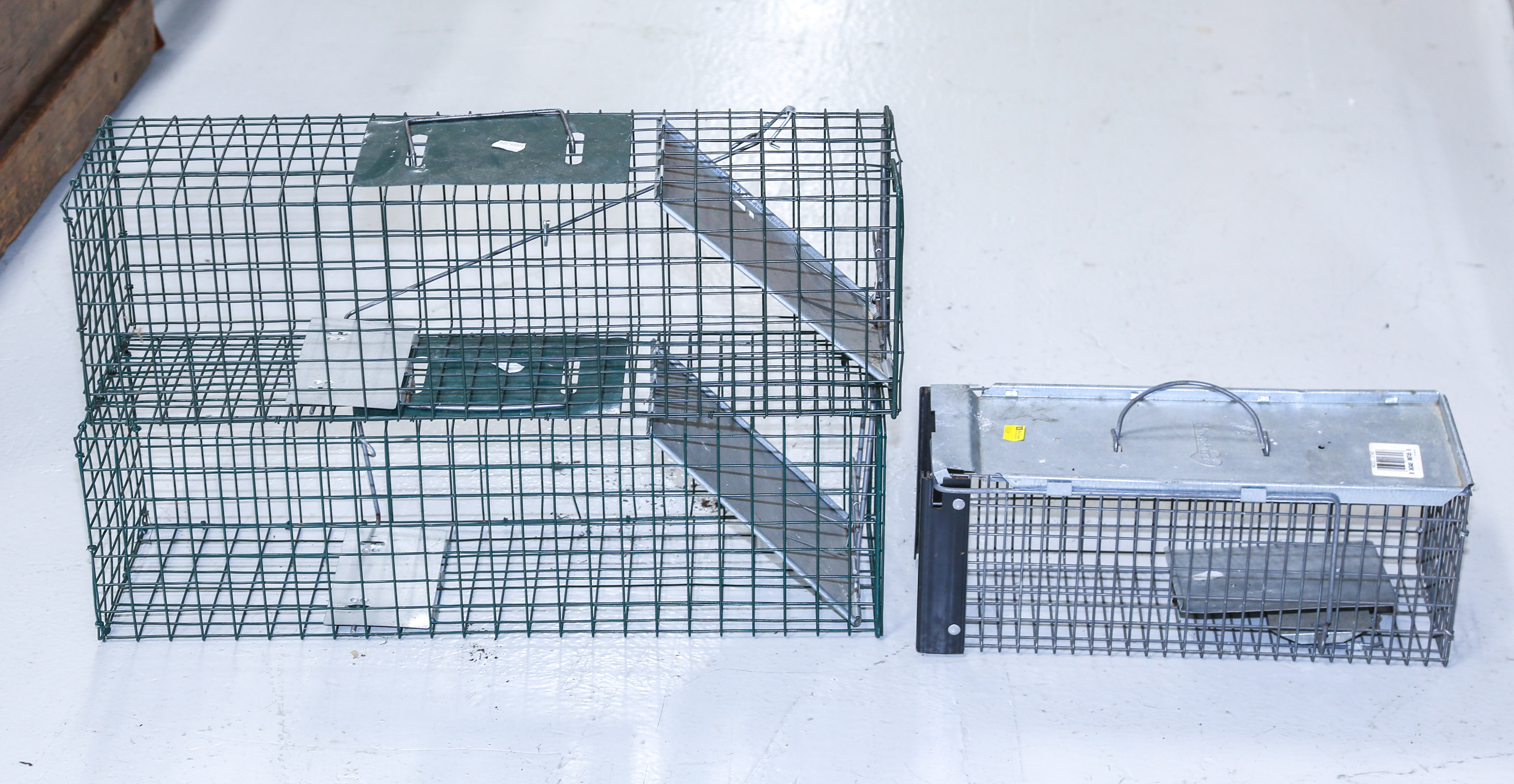 THREE RODENT TRAPS Two are 24 in. L.,