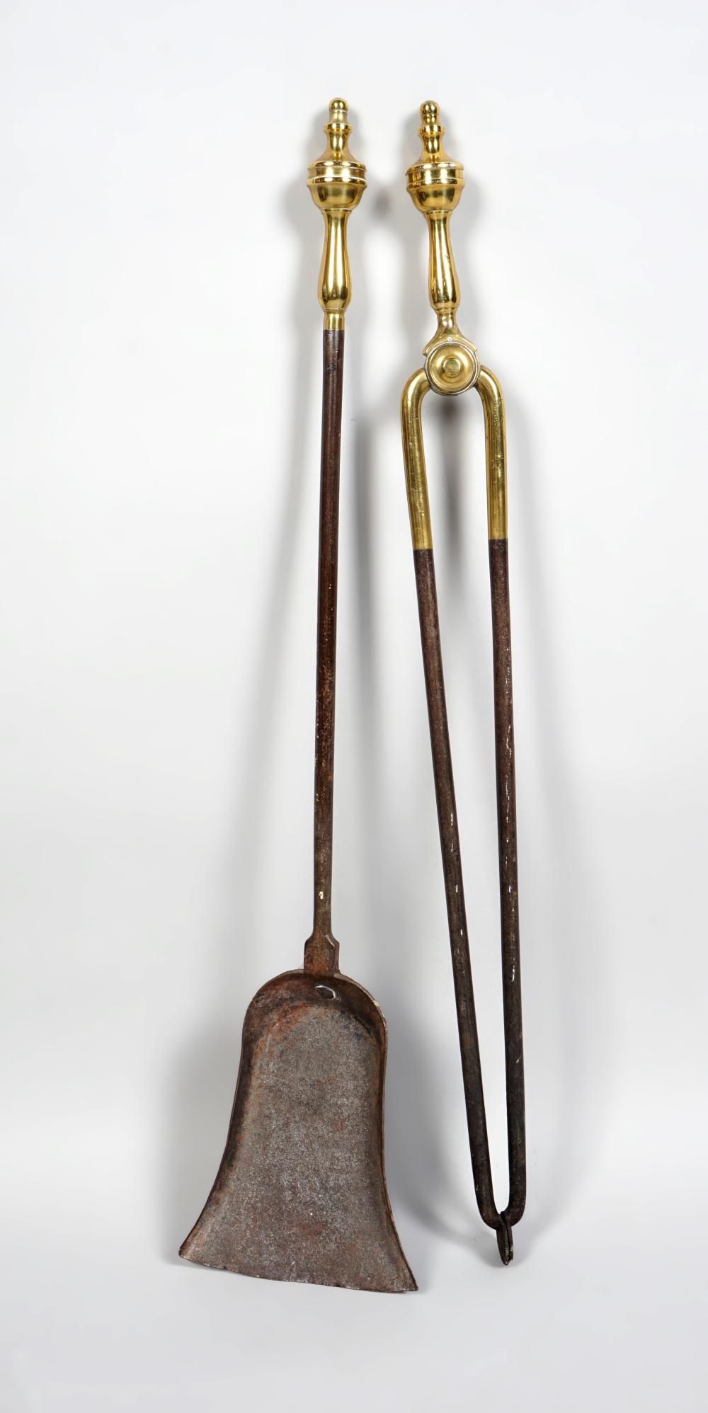 TWO GEORGE III BRASS AND IRON FIRE