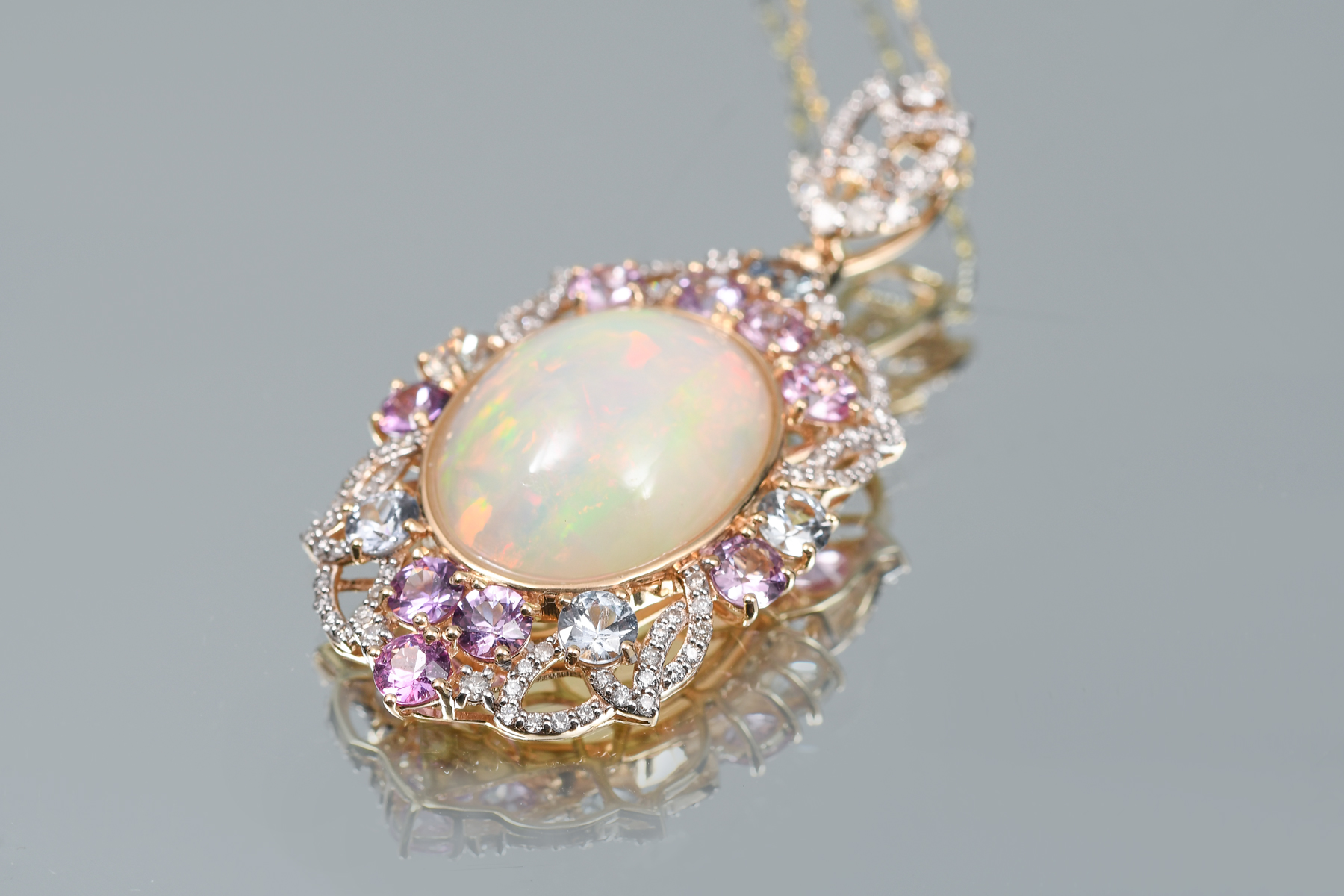 14K OPAL, SAPPHIRE & DIAMOND PENDANT: