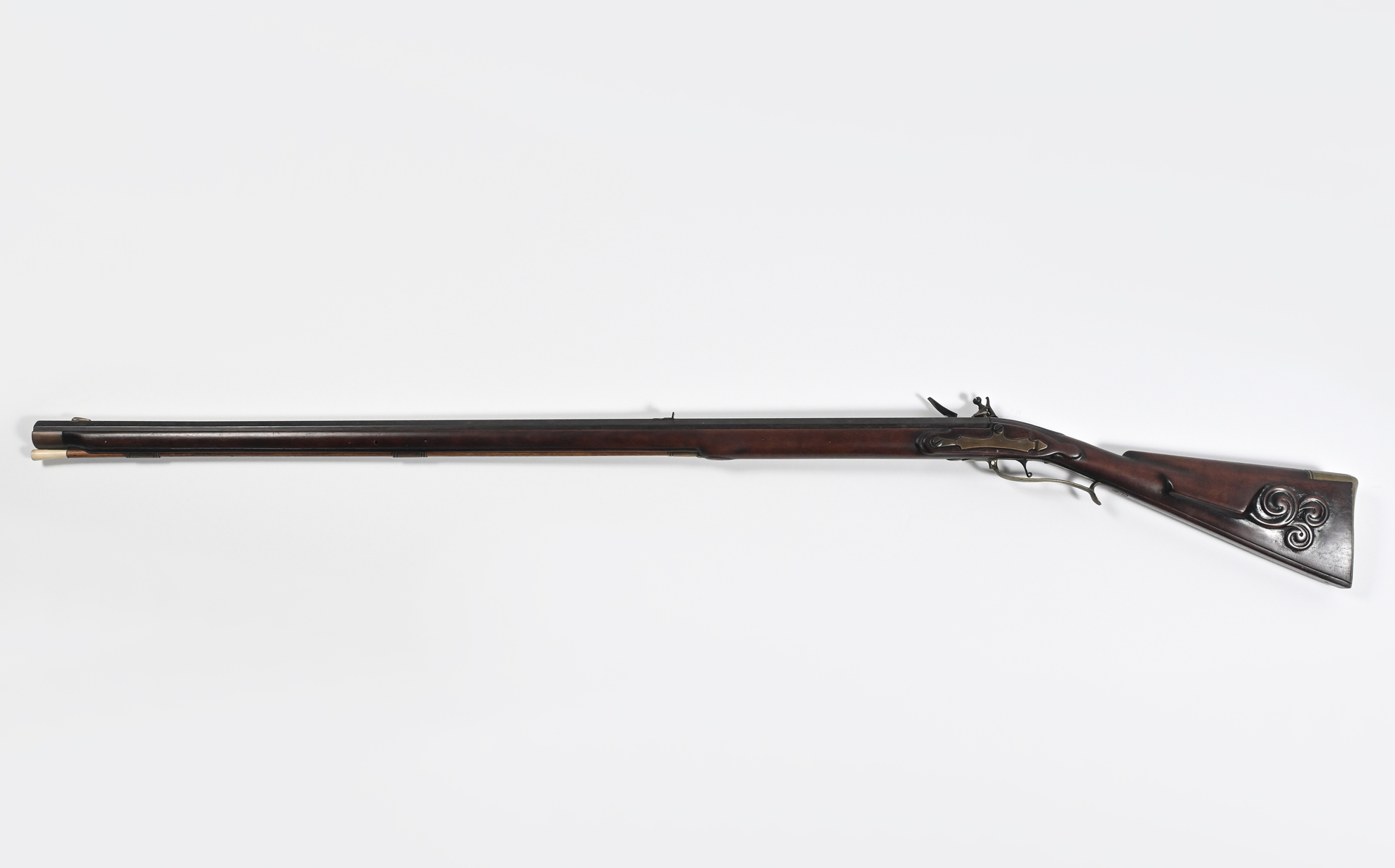 ANTIQUE BLACK POWDER RIFLE: Carved