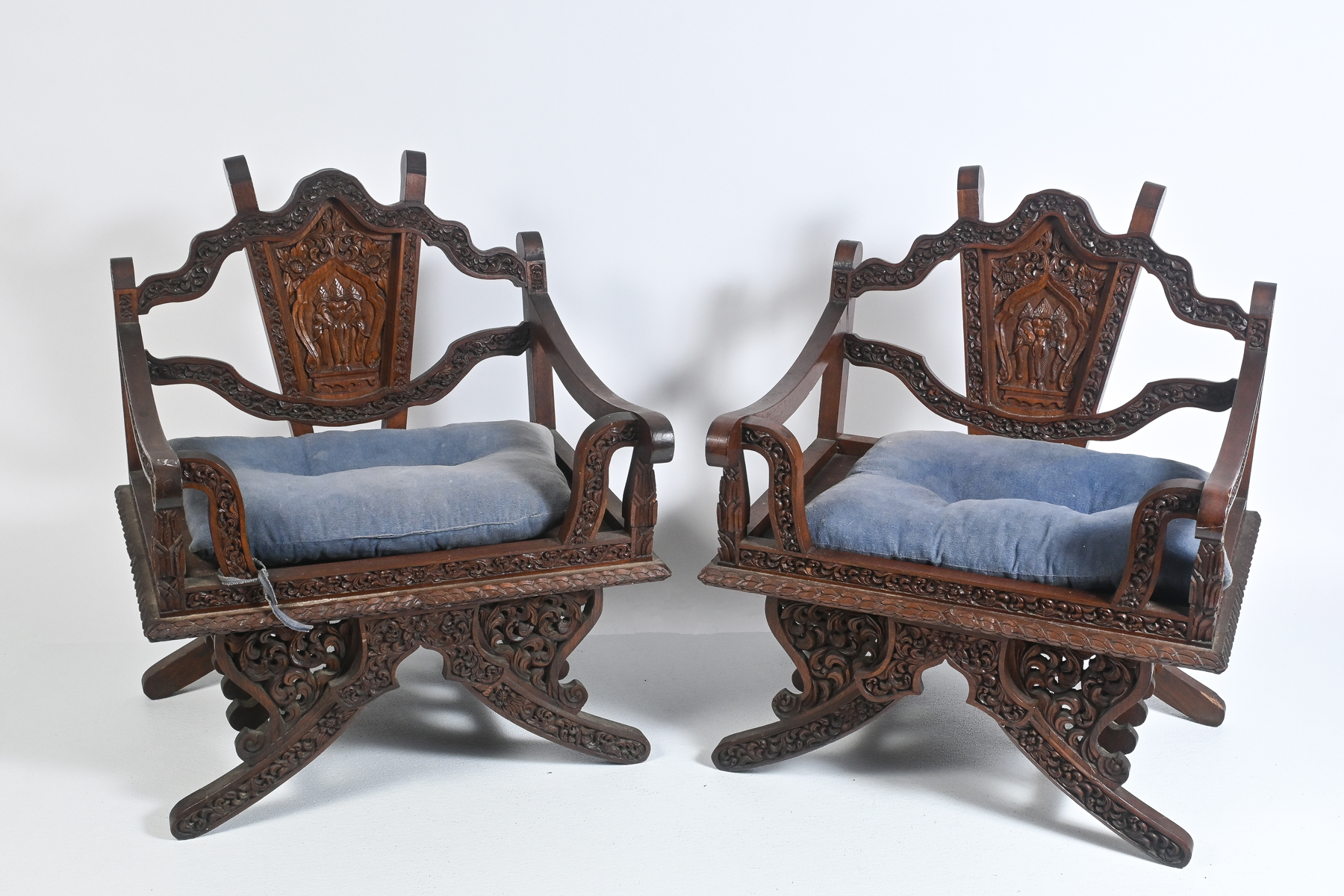 PAIR OF CARVED THAI ARMCHAIRS: