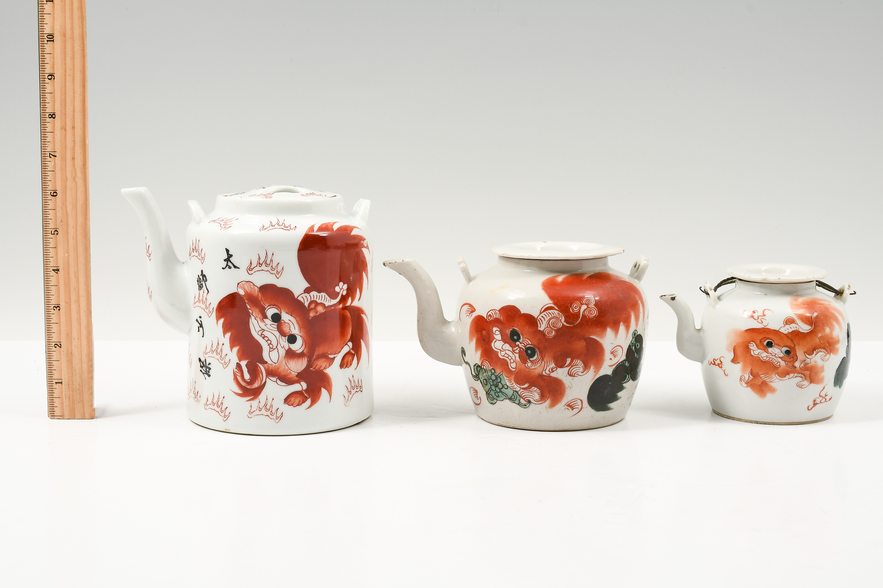 3 CHINESE IRON RED FOO DOG TEAPOTS  2ecf6c