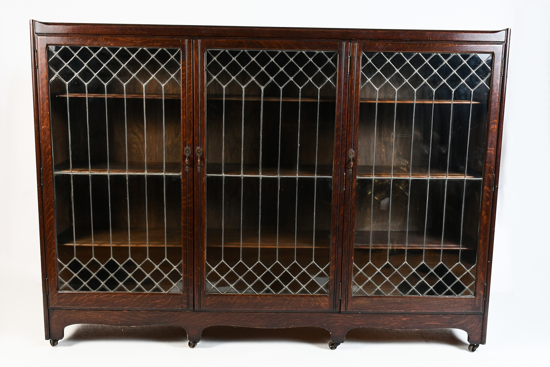 MAHOGANY 3-DOOR LEADED GLASS BOOKCASE: