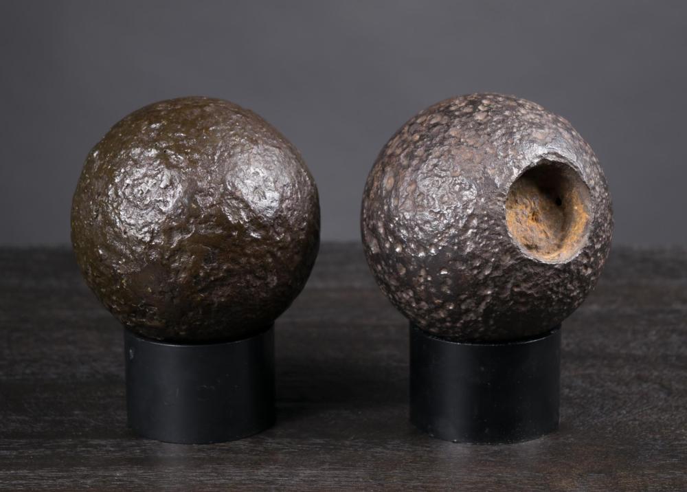 TWO CAST IRON CANNON BALLSTWO CAST 2ed4aa