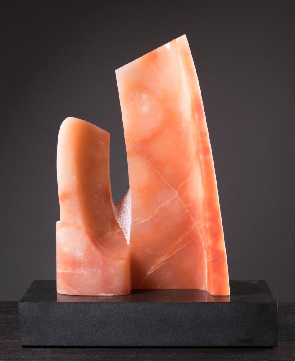 ORANGE STONE CARVING ON GRANITE PLINTHORANGE