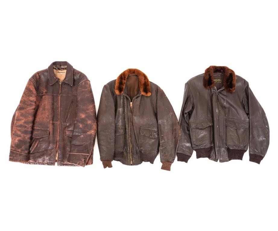 Three U.S.N. leather flight jackets