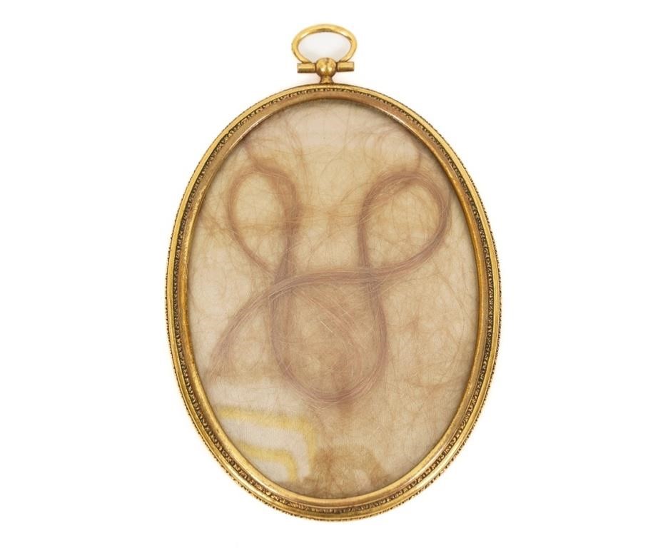Gold filled oval cased hair locket inscribed