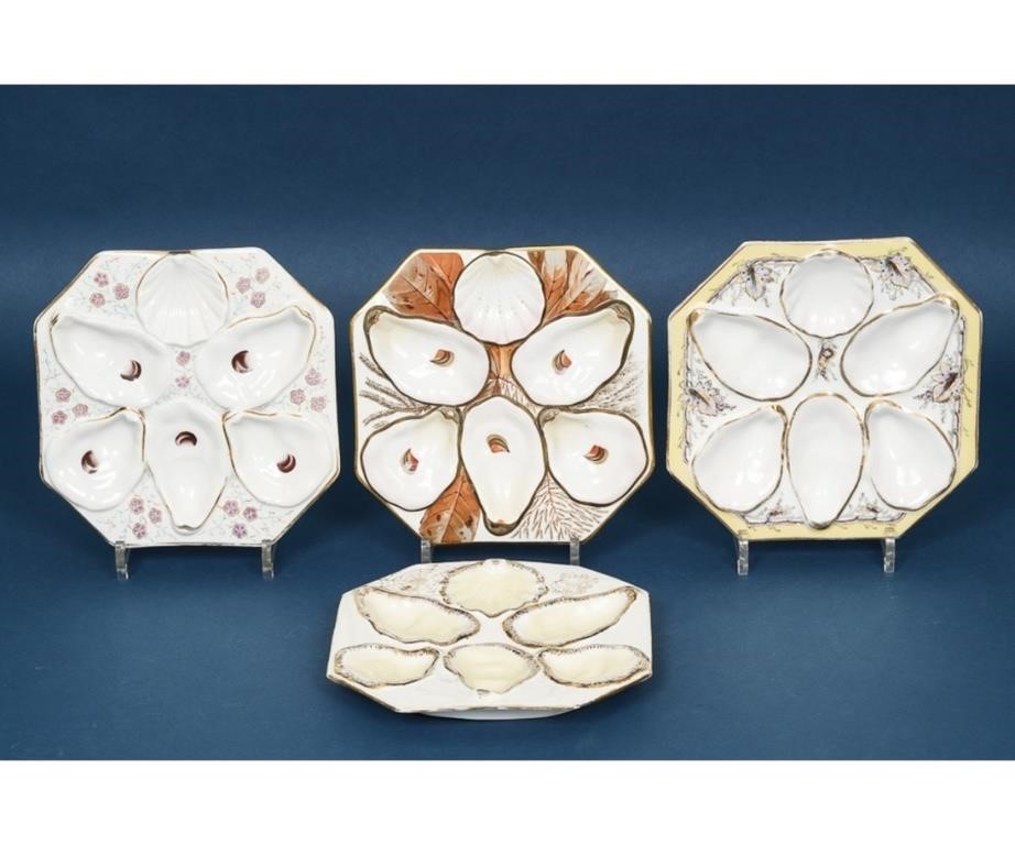 Four hexagonal shaped oyster plates,