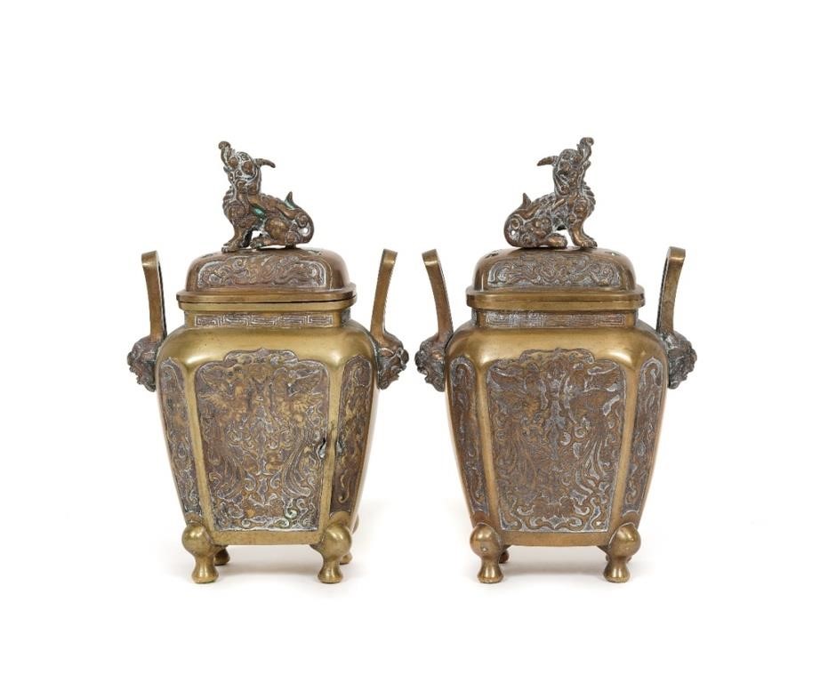 Pair of Asian bronze covered urns