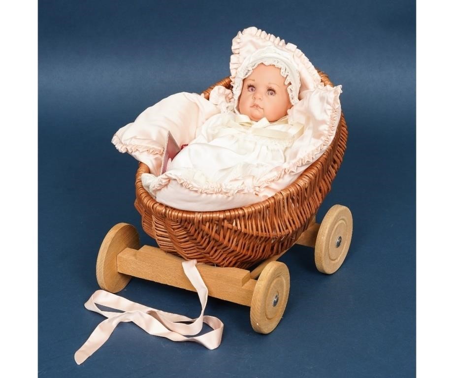 Gotz Baby Pia doll nestled in a wicker