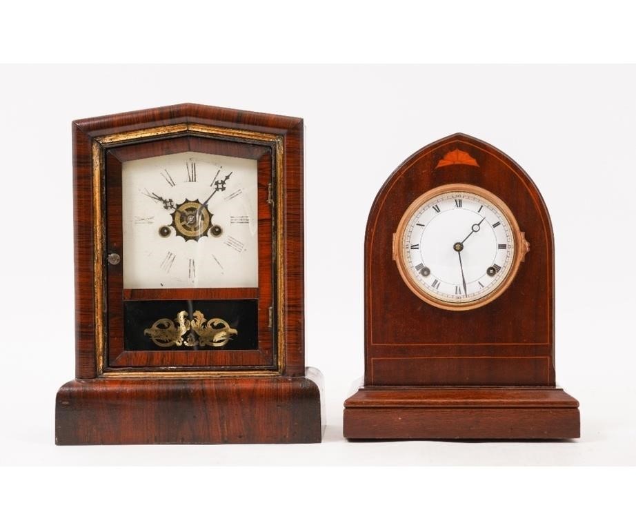 Two shelf clocks to include a "Peerless"