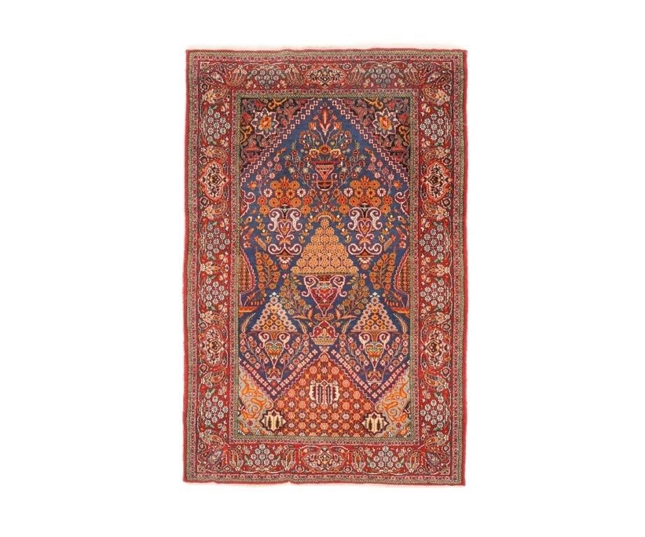 Colorful Kerman prayer mat with potted