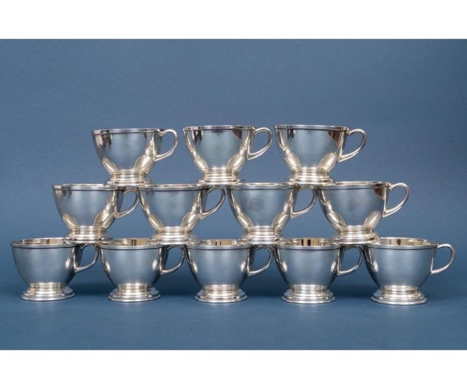 Set of twelve punch cups marked