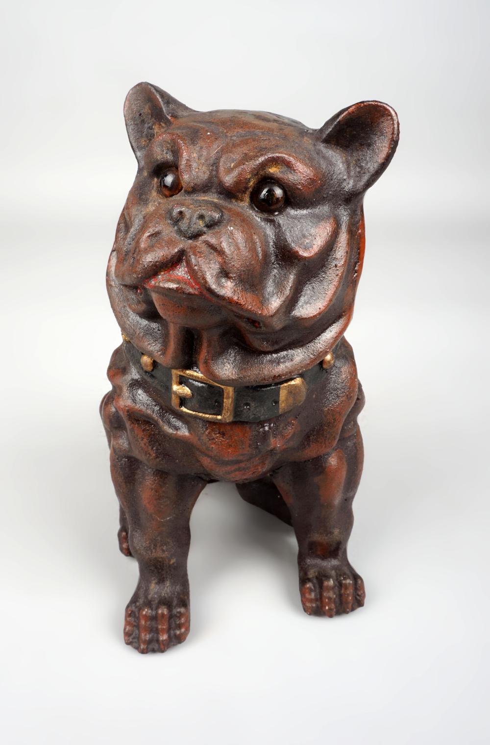 CAST IRON PIGGY BANK IN THE FORM