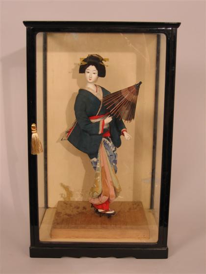 Japanese female doll in kimono     