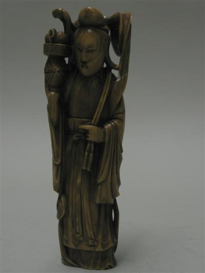 Stained ivory figure of Kannon