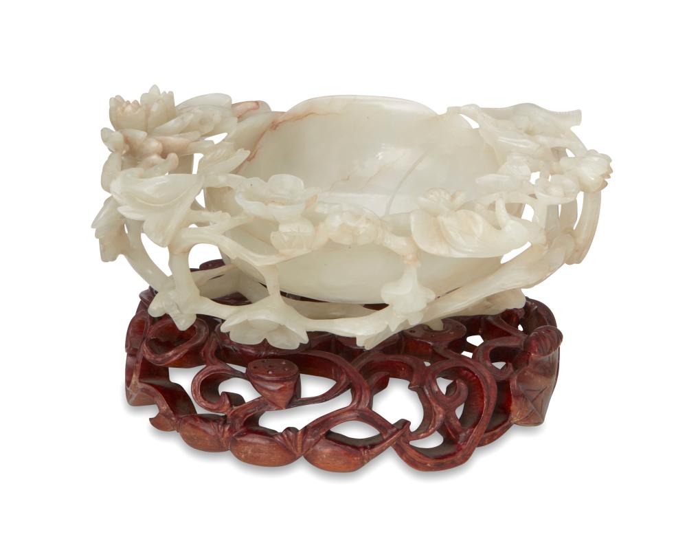 A CHINESE CARVED NEPHRITE BOWLA