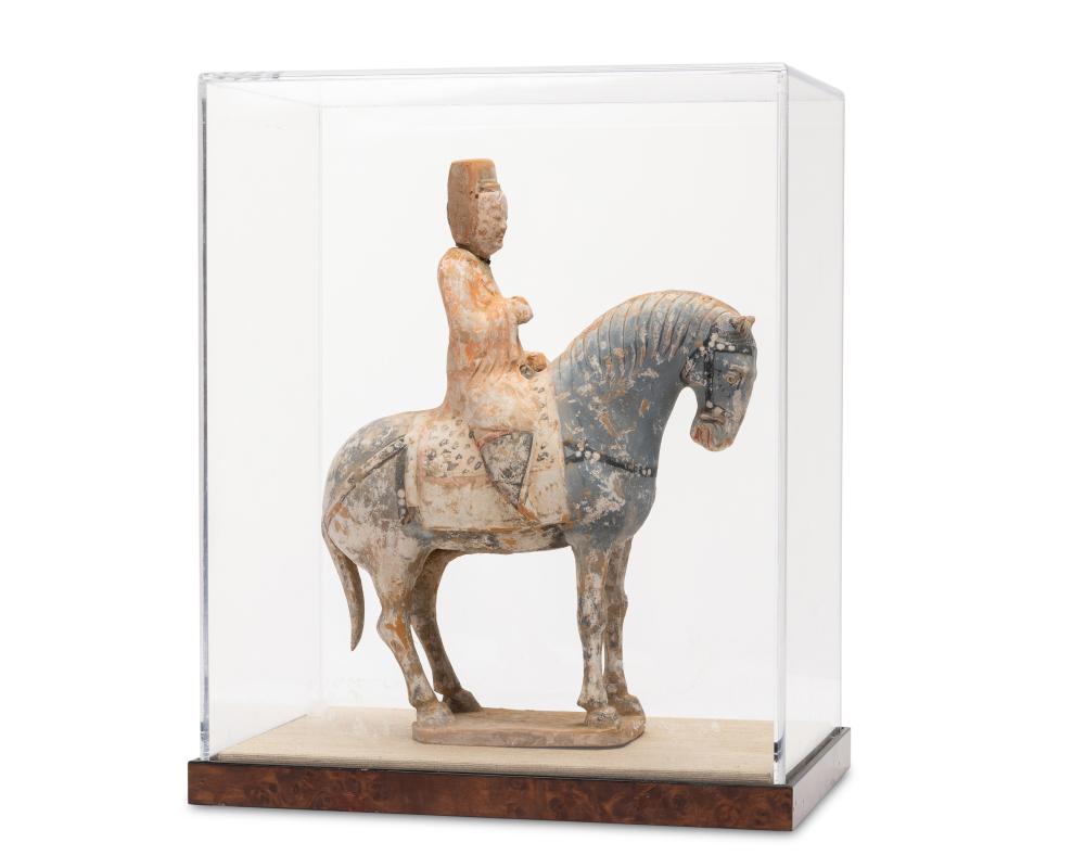 A CHINESE TANG-STYLE EARTHENWARE HORSE