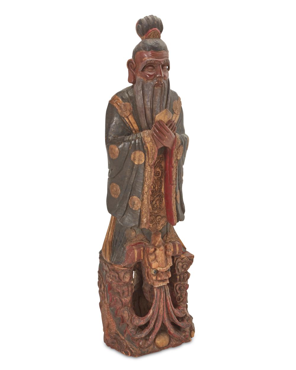 A CHINESE POLYCHROMED WOOD SCULPTURE