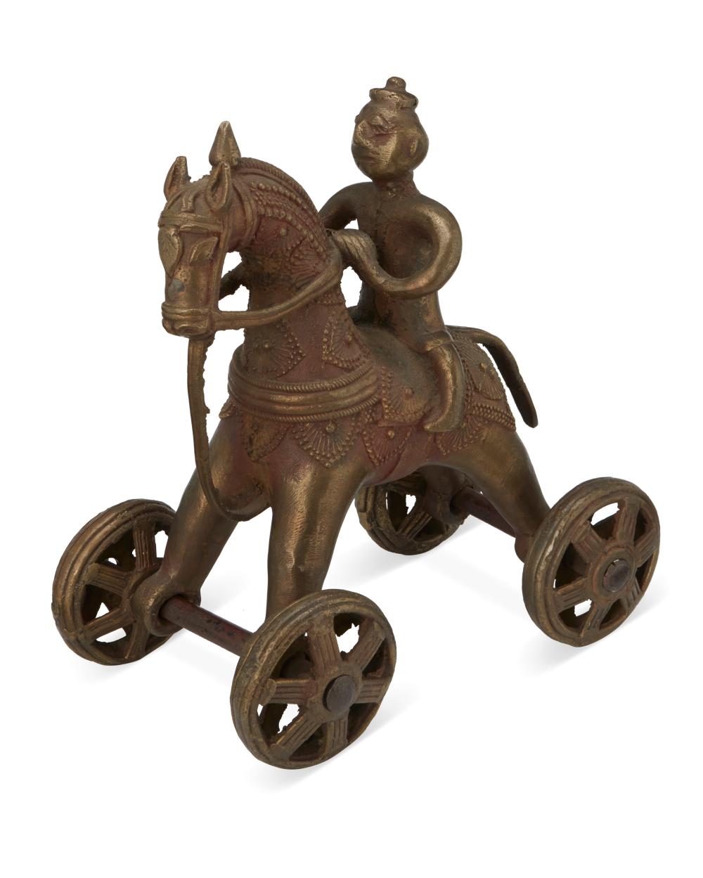 AN INDIAN DEVOTIONAL CAST BRASS HORSE