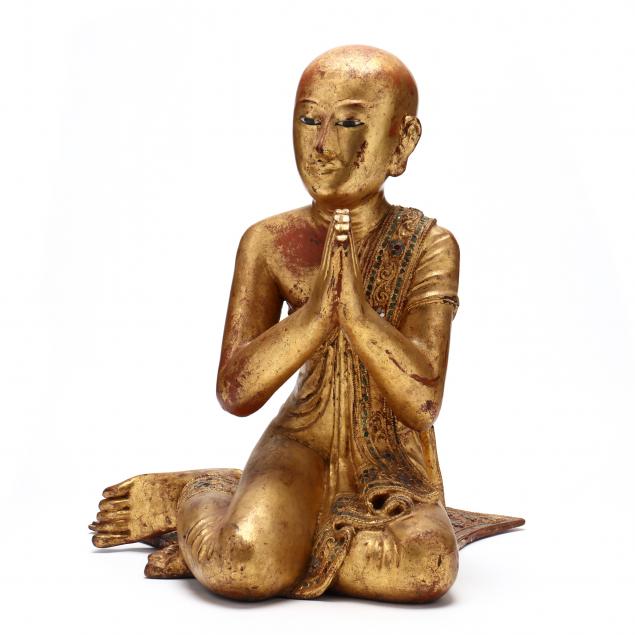 A BURMESE CARVED GILT AND LACQUERED