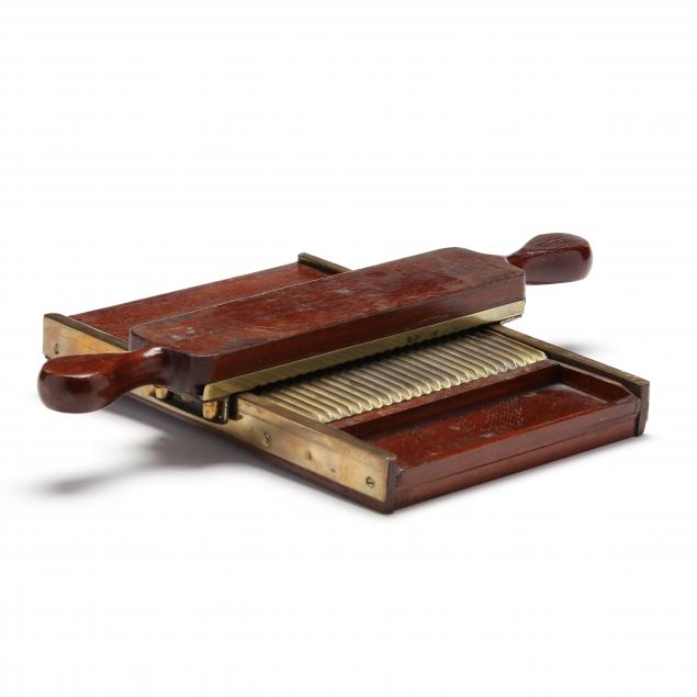 TWO PIECE MAHOGANY PILL ROLLER