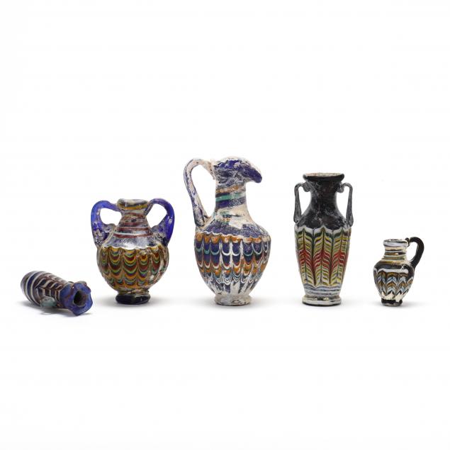 FIVE PHOENICIAN STYLE CORE GLASS VESSELS