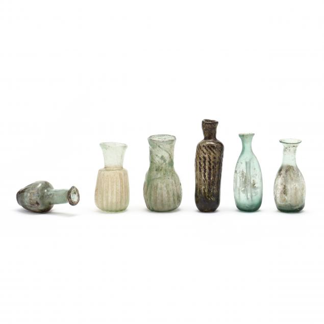 SIX SMALL FLUTED ROMAN STYLE GLASS