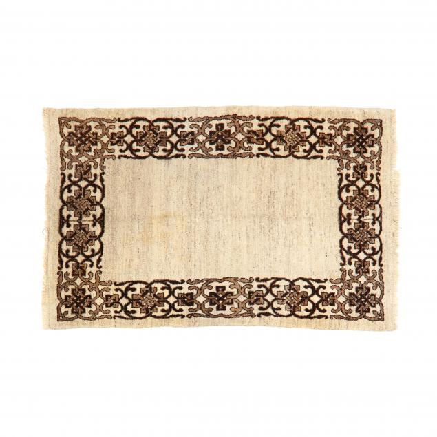 HANDWOVEN WOOL RUG With open mottled