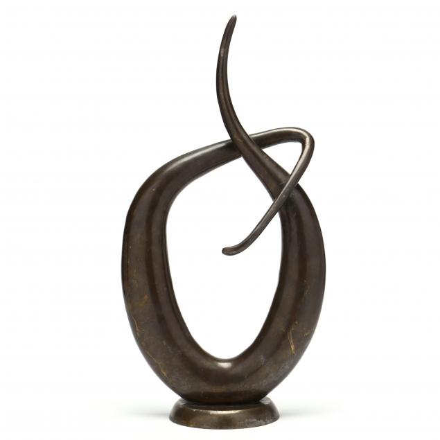 AN ABSTRACT BRASS SCULPTURE Mid-century,