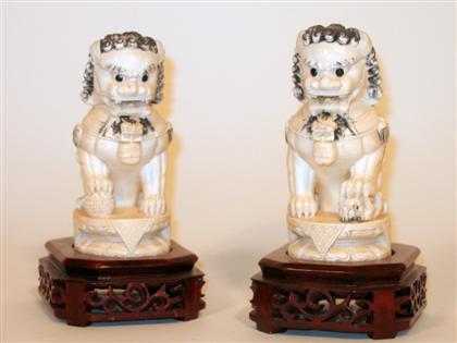 Pair of elephant ivory Fu lions    Carved